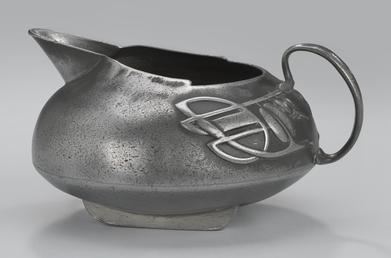 Liberty Tudric milk jug designed by Archibald Knox
