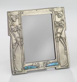 Liberty Tudric mirror and frame designed by Archibald…
