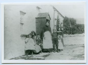 Cregneash Woman and children outside a cottage
