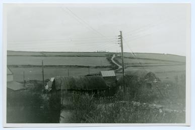 Cregneash Karran Farm in foreground showing telephone poles