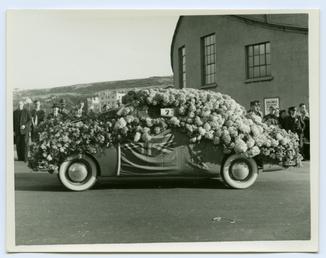 Douglas Carnival and a flower covered car