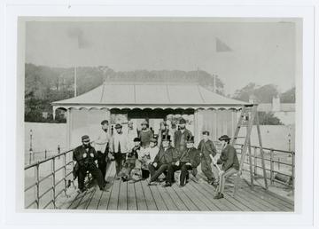 Workmen, attendants and toffs on Iron Pier, Broadway,…
