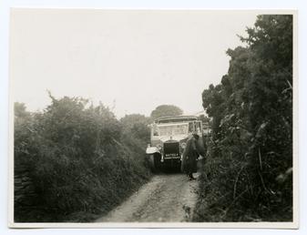 A charabanc (Gilford bus MN 7664) stationary at…