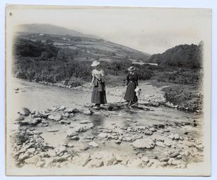 Two ladies fording the river at Cornaa, Maughold