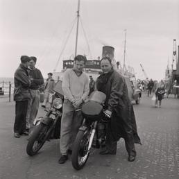 Manx Grand Prix motorcycles arrive, Douglas pier