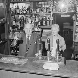 Retiring publican behind the bar, Isle of Man