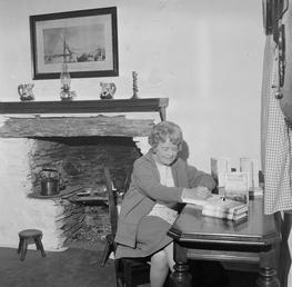 Mona Douglas book-signing in Molly Carrooin's Cottage, Onchan