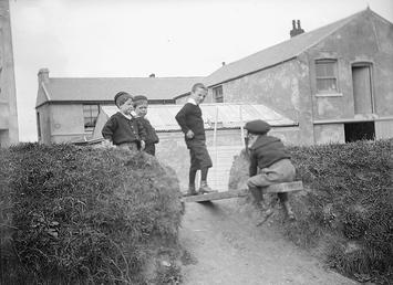 Children on a see saw, Douglas, Isle of…