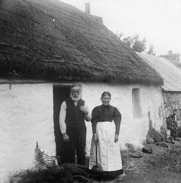Manx Couple outside Thatched Cottage, Isle of Man