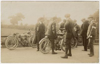 Group of TT (Tourist Trophy) riders and marshals,…