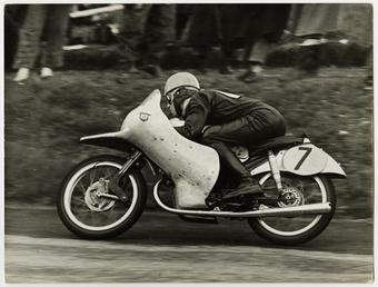 Werner Haas, riding NSU (number 7) 1954 TT…