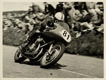 John Surtees riding as number 81 at Kate's…