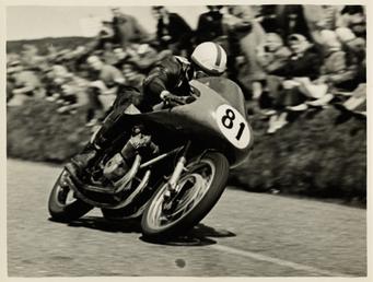 John Surtees, riding as number 81, 1956 TT…