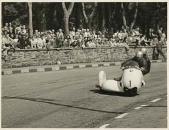 Walter Schneider, driving a BMW sidecar outfit, 1958…