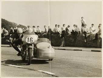 Eric Oliver, driving sidecar outift (number 16), 1958…