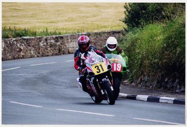 John Crellin and another competing in Southern 100,…