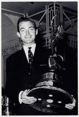 Hugh Anderson holding TT (Tourist Trophy)  trophy, 1963