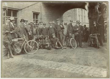Early motorcyclists group at Quiggin's Timber Yard, Douglas