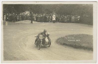 F.W. Dixon aboard sidecar outfit number 55, 1923…