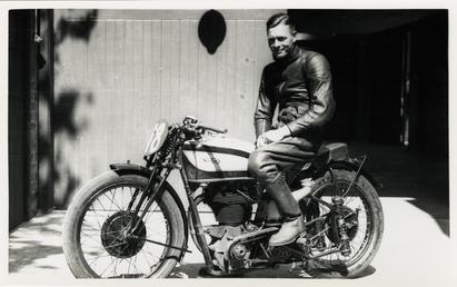 Freddie Frith poses aboard Norton number 18, 1939…