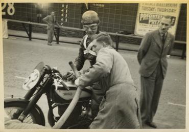 Albert Moule aboard Norton number 52 refuelling at…