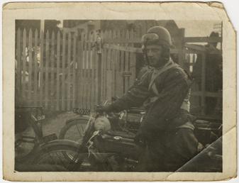 T.M. Sheard aboard machine registration MN497, Grandstand, 1914…
