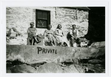 Group of four seated outside at Niarbyl on…