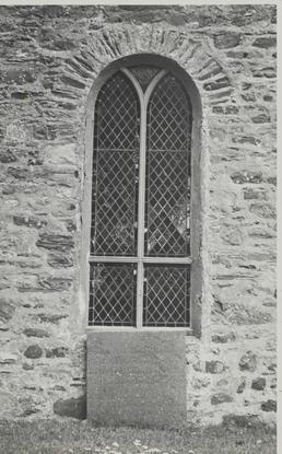 East window and tombstone of reverend James Wilks,…