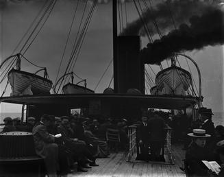 Crowded deck of am unidentified steamship, Isle of…