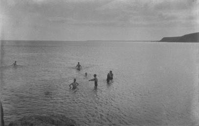 Group of men bathing in the sea, [Port…