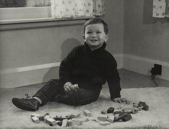 Donald Lindsay,sitting on floor with toy bricks