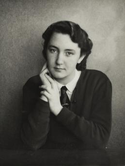 Brenda Cain, pictured seated at Ramsey Grammar School