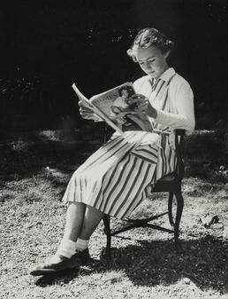 Helen Duckworth, pictured reading a magazine outdoors, seated…