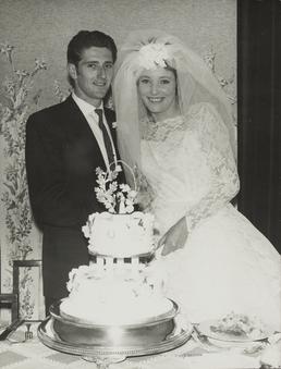 John Christian and Kathleen Shacklady cutting their wedding…