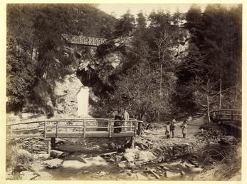 Glen Helen waterfall and rustic bridge