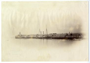 Steamship alongside pier