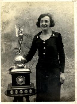 Mrs Frieda Miller with a trophy won by…