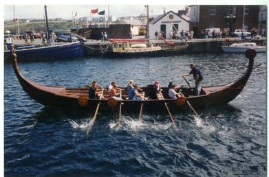 Viking longboat rowed out of Peel harbour