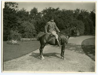 Edward Curphey Farrant (of Ballakillingan) riding a horse