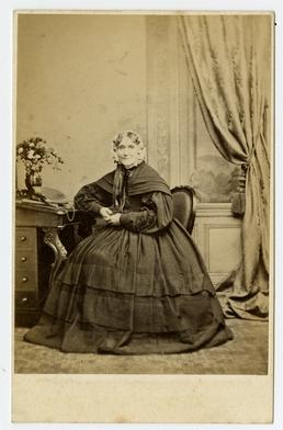 Harriet Jackson - seated at desk