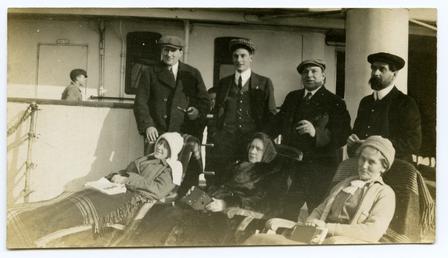 Boat passengers, including Archibald Knox