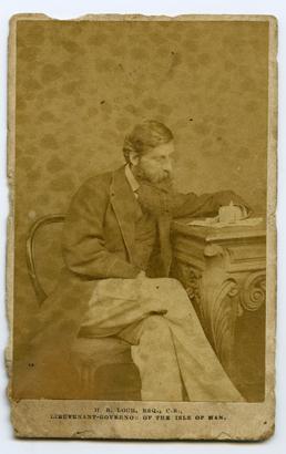 Lord Loch - seated at a desk