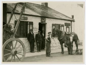 Horse and workmen outside Ballasalla smithy