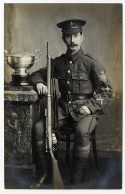 Unidentified studio portrait marksman with trophy and rifle