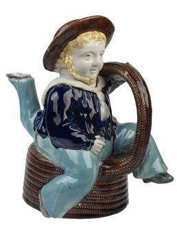 Three-legged sailor souvenir teapot